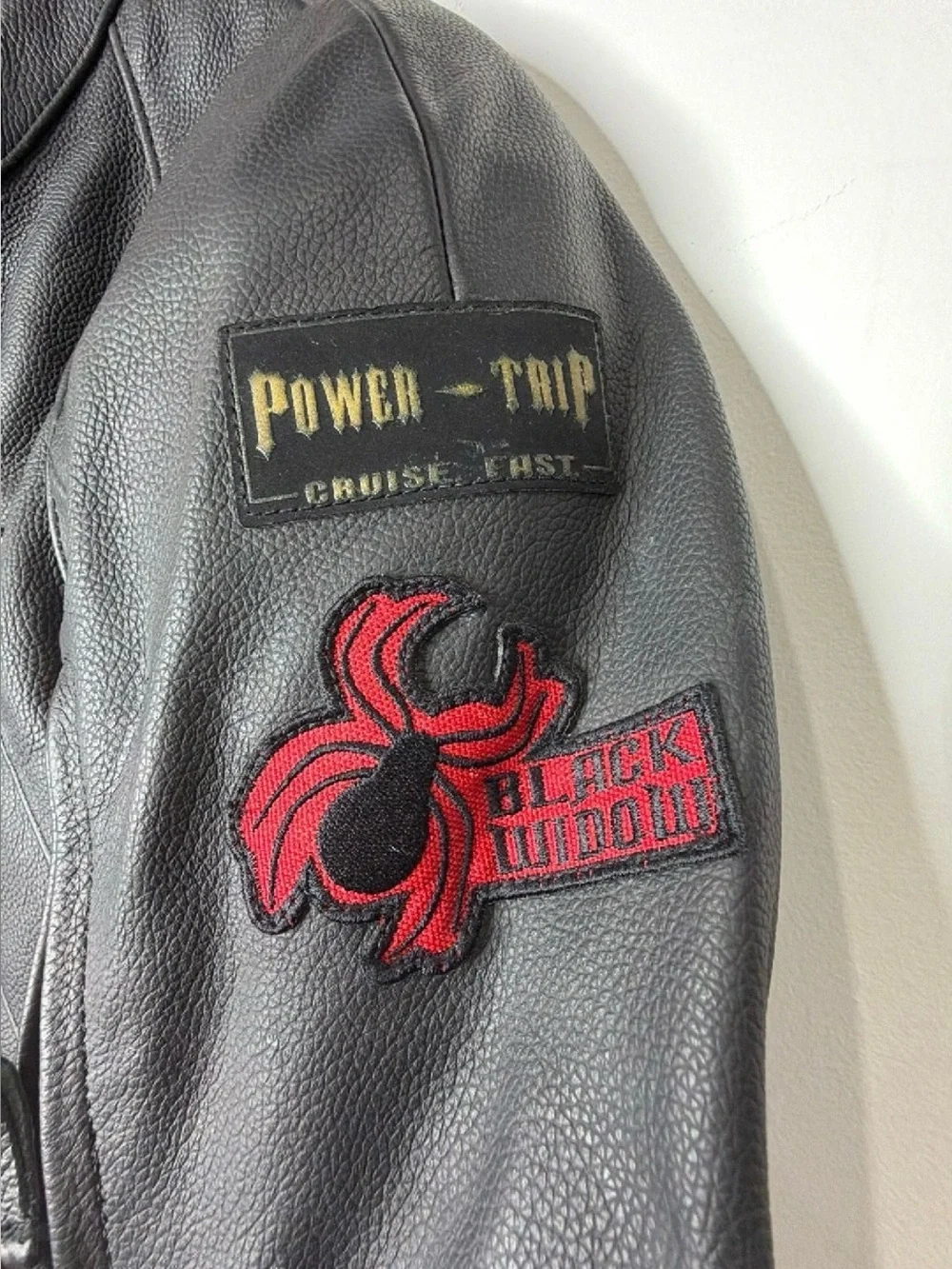 Black Leather Rider Jacket with Red Patch Details
